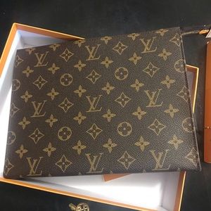 SOLD!!! Authentic Lv toilet pouch size 26